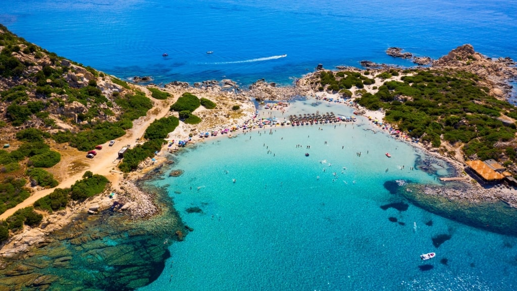 People relaxing in Punta Molentis Beach