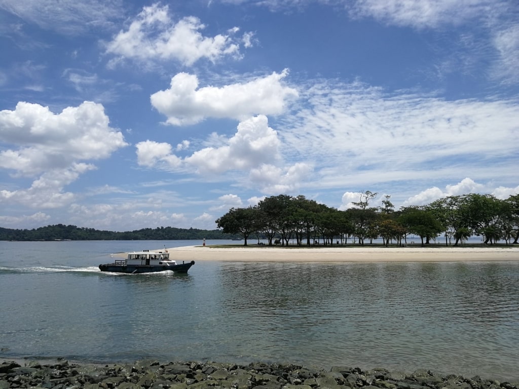 Boat passing by Changi Beach