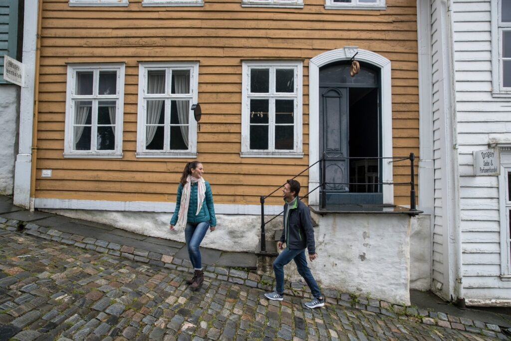 Couple exploring Old Bergen Museum