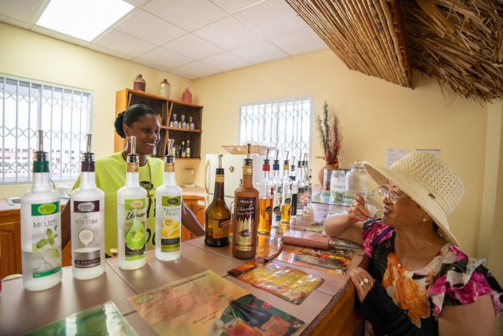 Woman on a rum tasting tour in Grenada Distillers