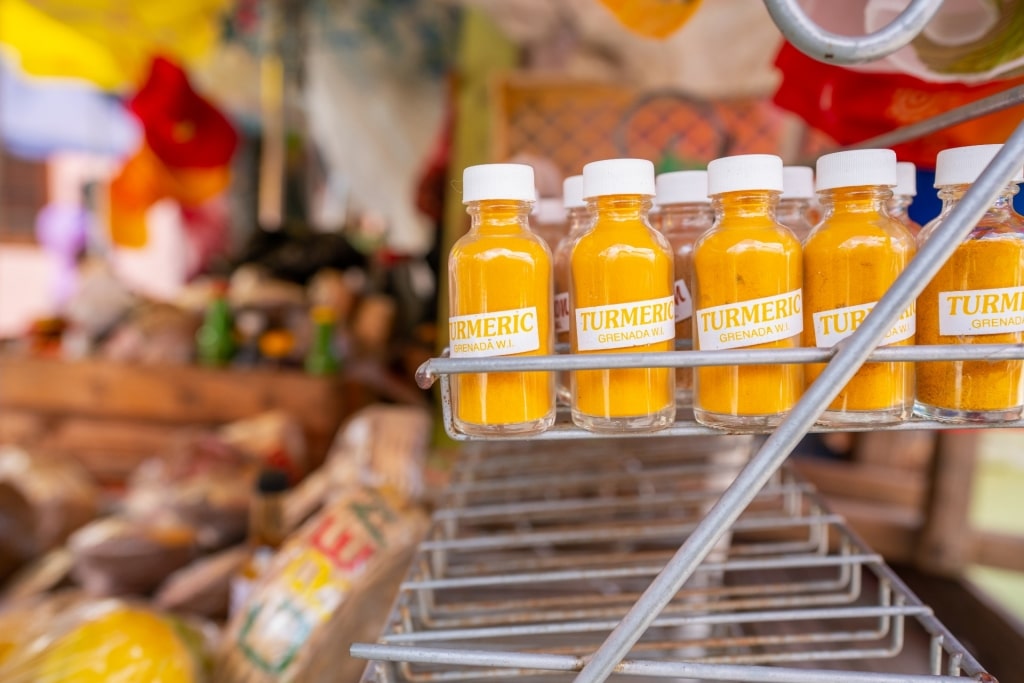 Bottles of turmeric being sold at a market in Grenada