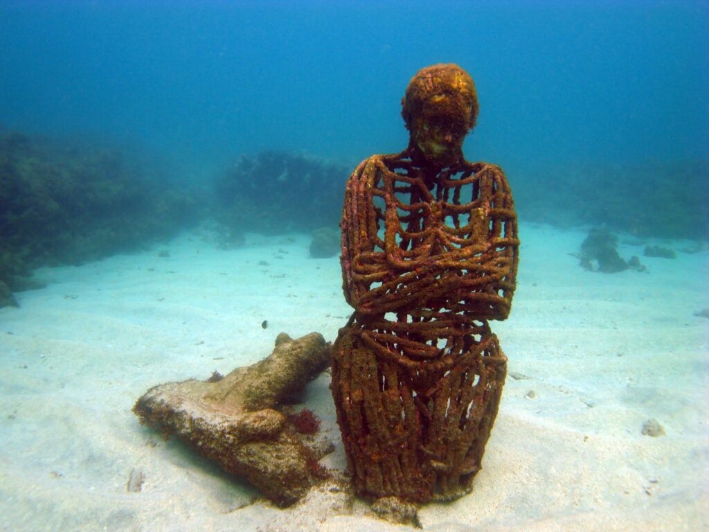 Iconic statue of the Underwater Sculpture Park in Grenada