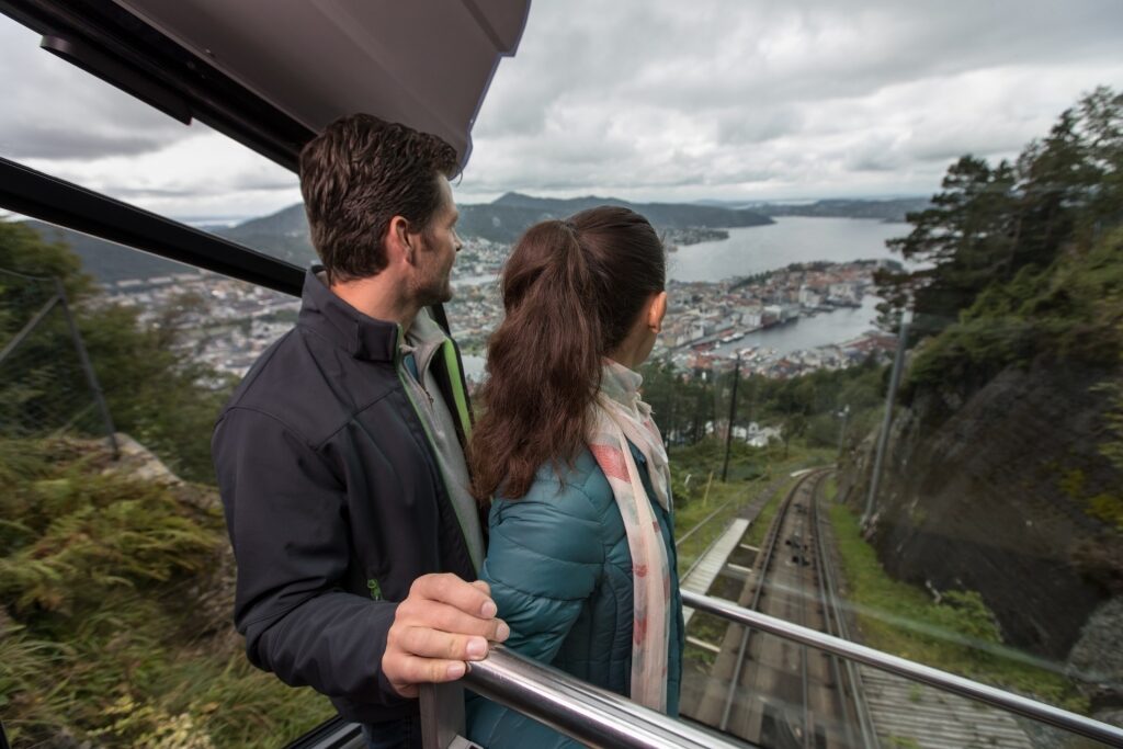 Couple inside Fløibanen funicular, Bergen