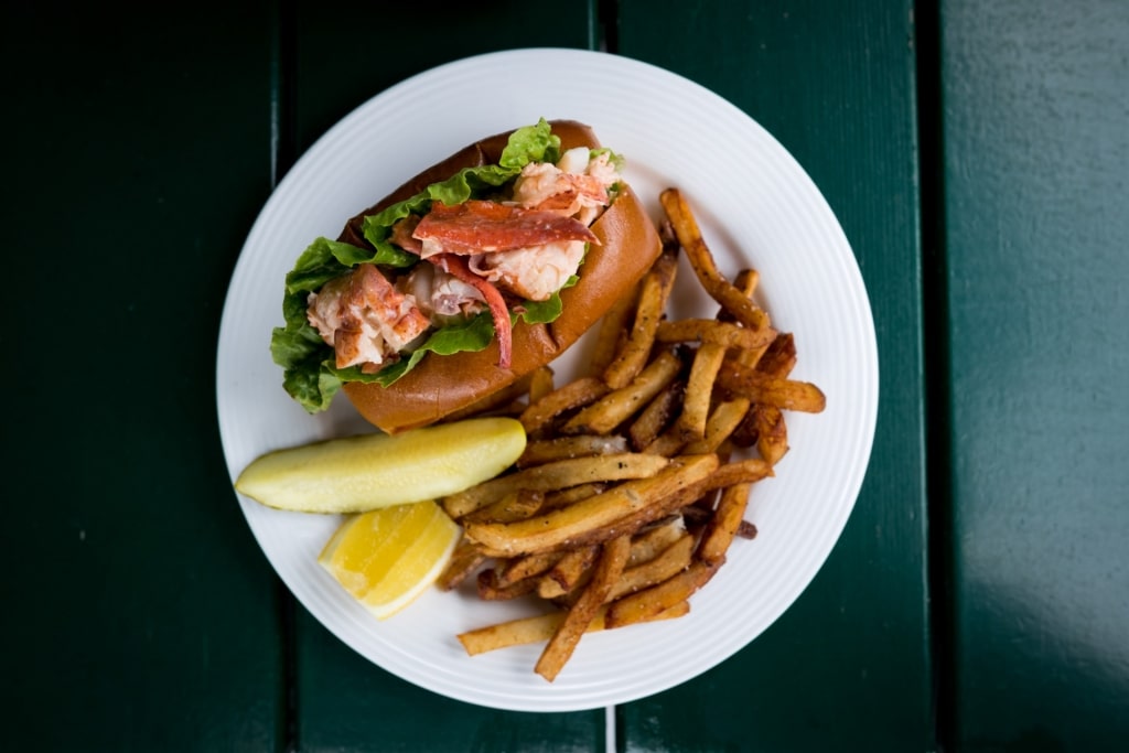 Lobster on a plate with fries on the side