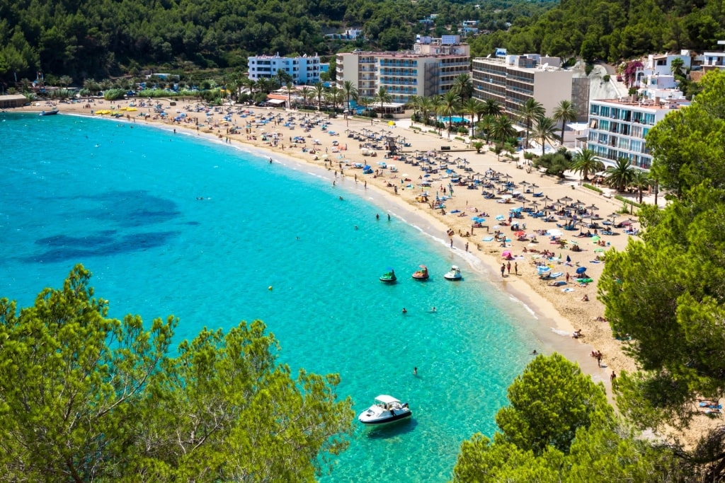 People lounging on Cala de Sant Vicent