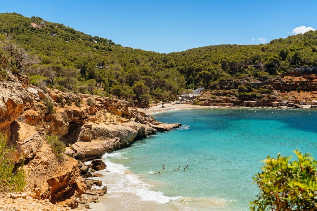 Cliffs towering over Cala Saladeta