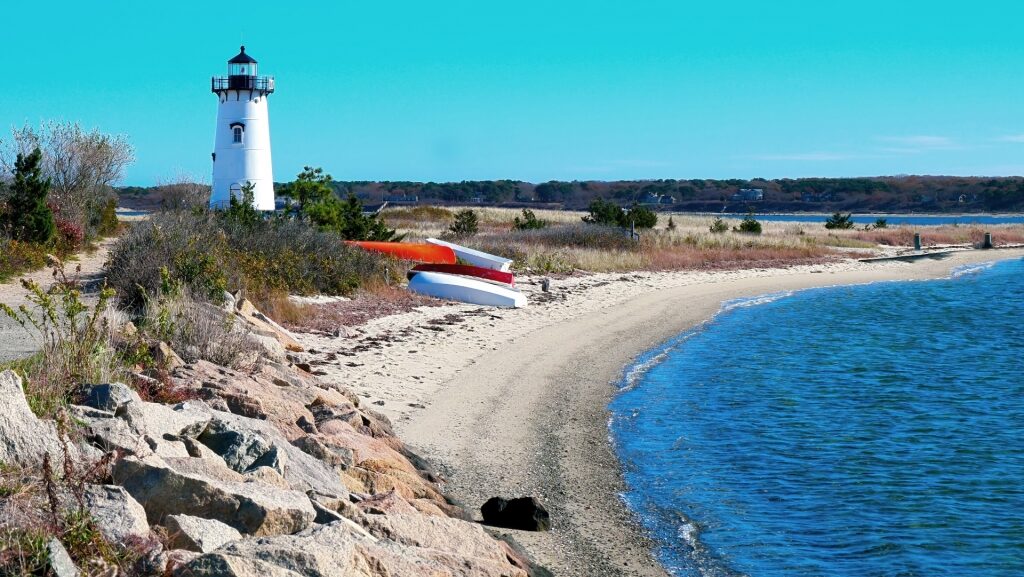 Lighthouse towering over a beach in Martha's Vineyard, Massachusetts