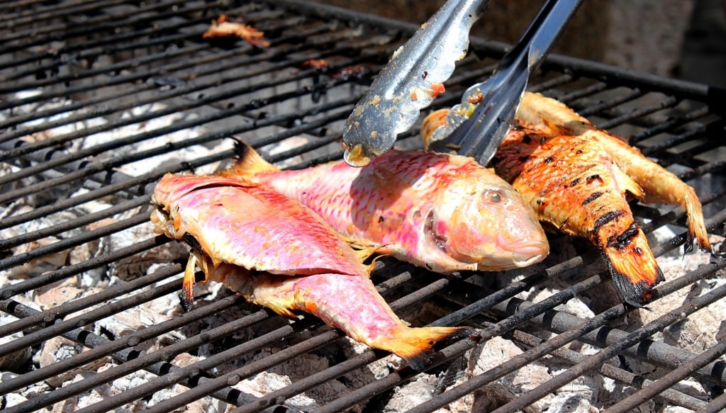 Man grilling fish