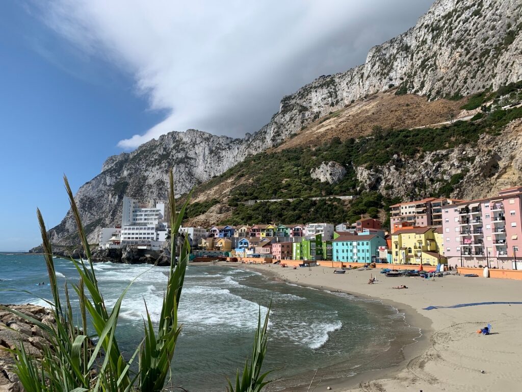 Seaside view of Catalan bay with cliffs
