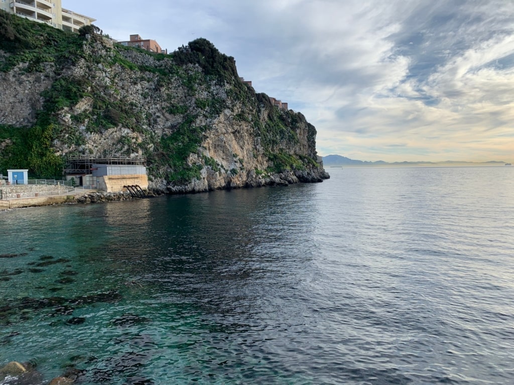 Cliffs towering over Little Bay Beach