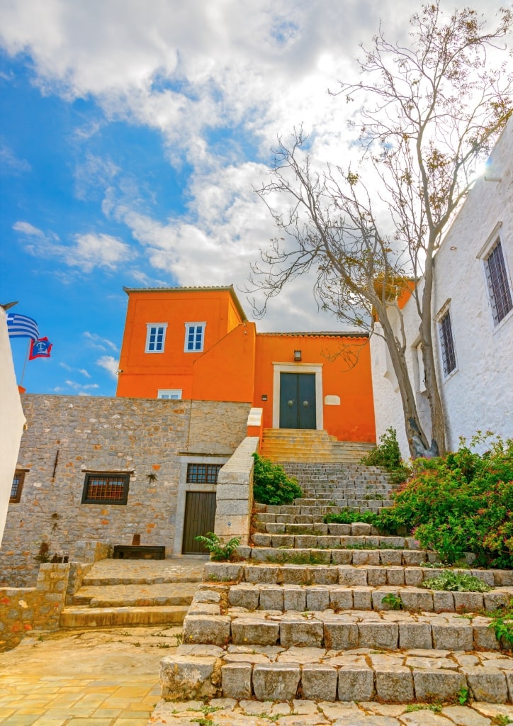 Bright orange facade of Lazaros Koundouriotis Historical Mansion