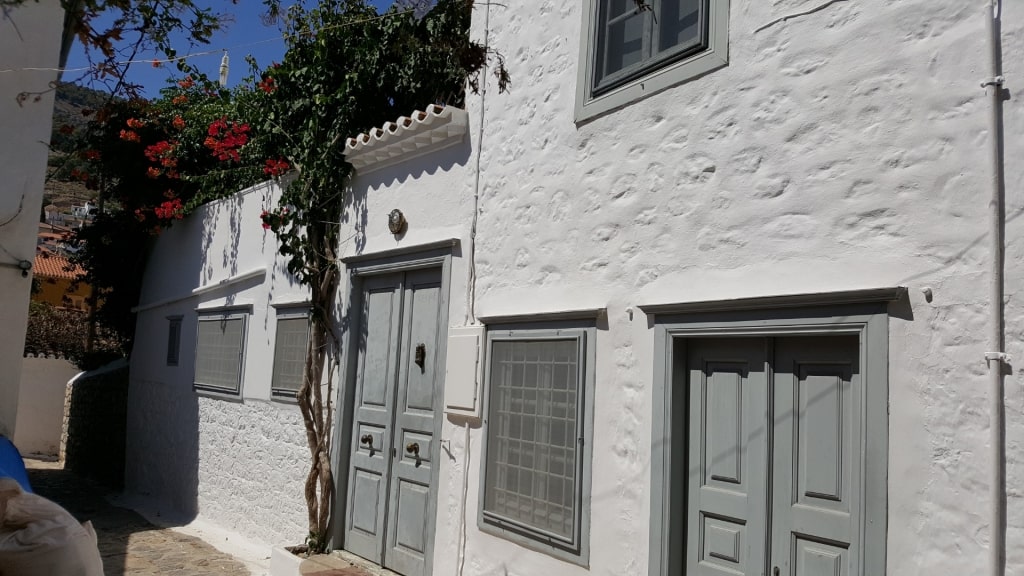 White exterior of Leonard Cohen House