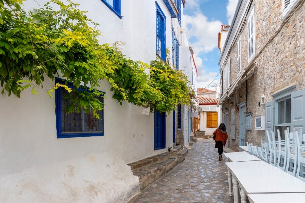 Woman strolling the streets of Hydra