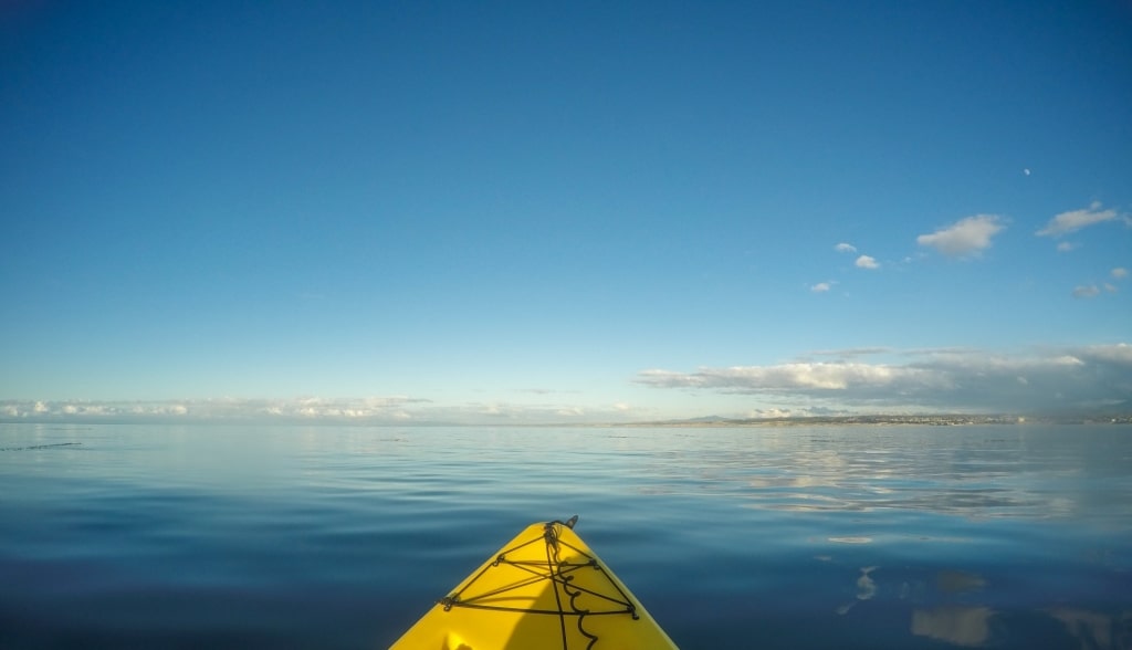 Person kayaking in Monterey Bay