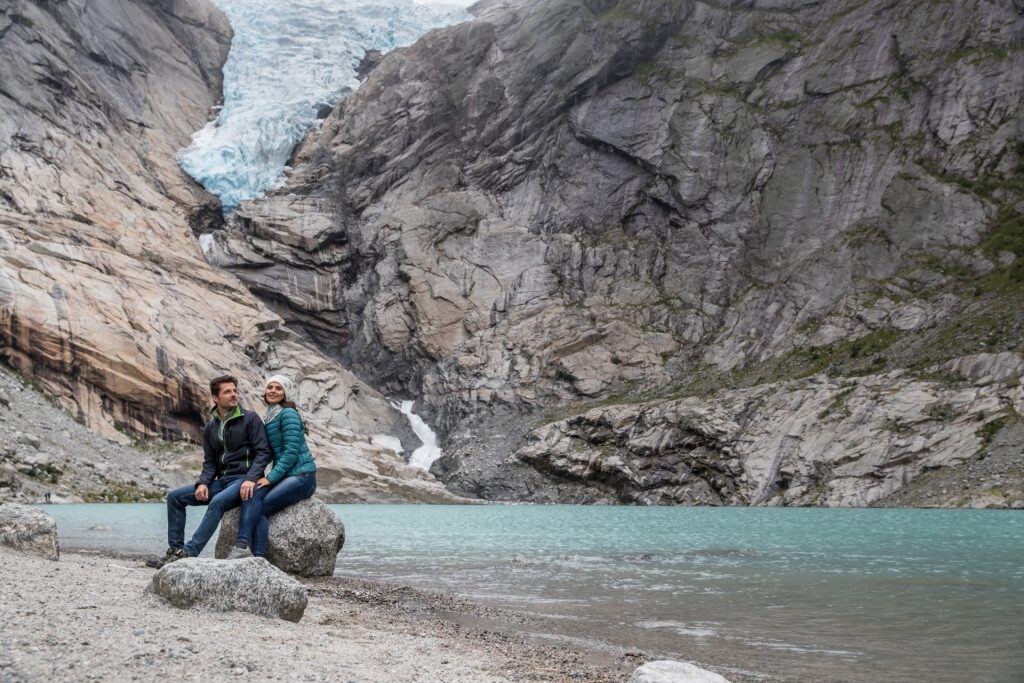 Couple enjoying the beautiful landscape of Jostedalsbreen National Park Center
