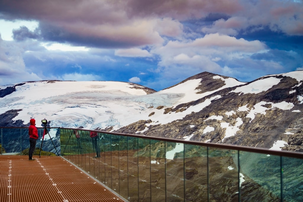 Woman sightseeing from Geiranger Skywalk