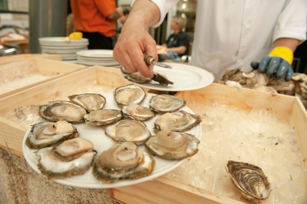 Man preparing oysters