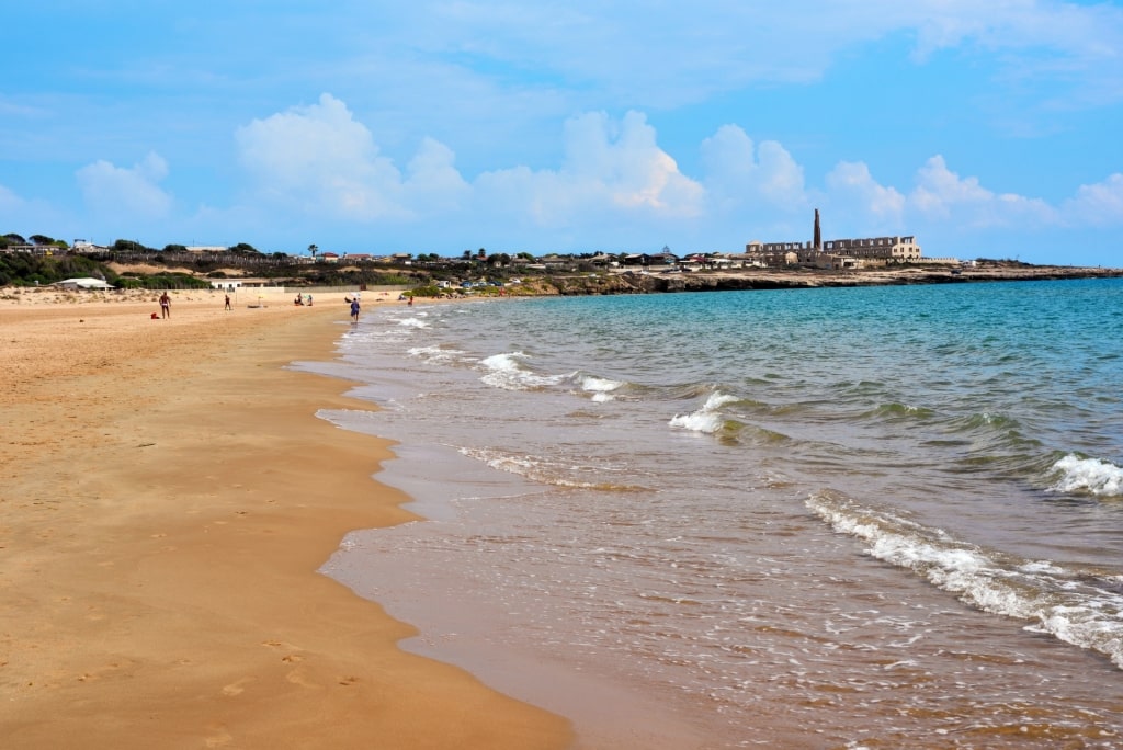 Brown sands of Sampieri Beach, Near Catania