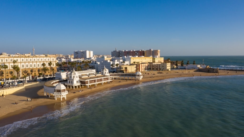 Calm waves of La Caleta Beach in Seville, Spain