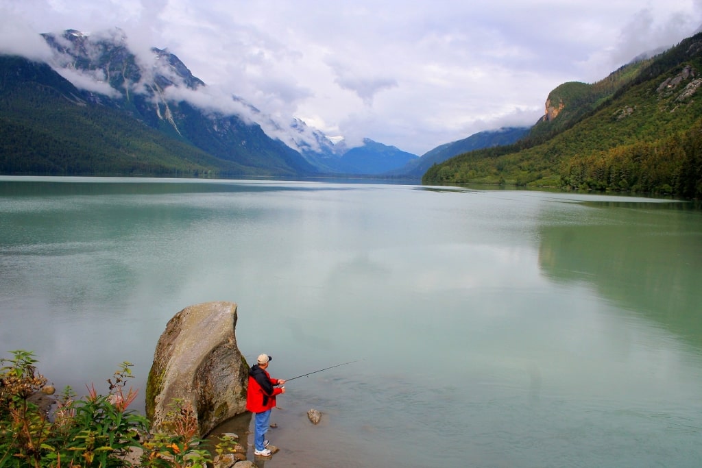 Man fishing from Chilkoot Lake, near Skagway