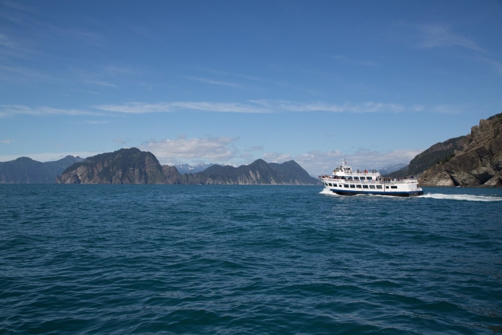 Boat cruising the Kenai Fjords