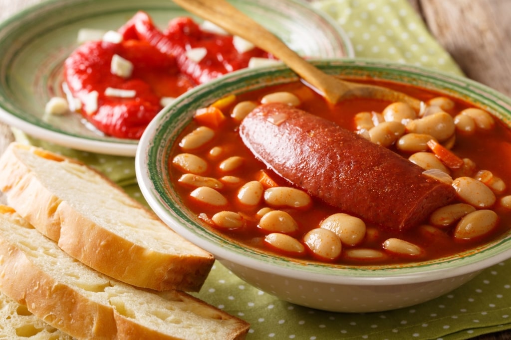 Hearty grah in a bowl with bread on the side
