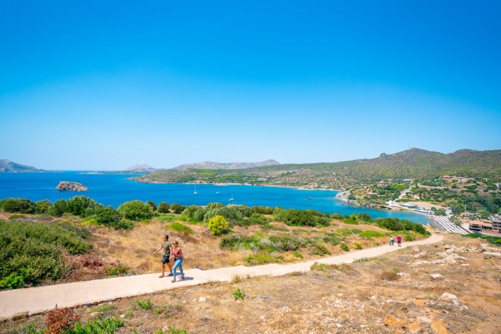 Couple hiking to Cape Sounion, near Athens