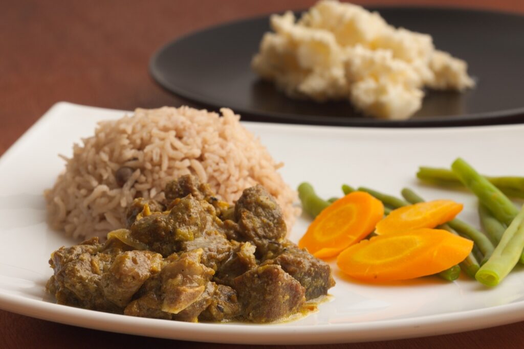 Curried goat with rice