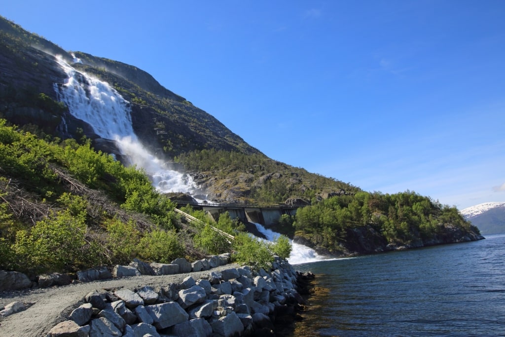 Roadside view of Langfoss Waterfall