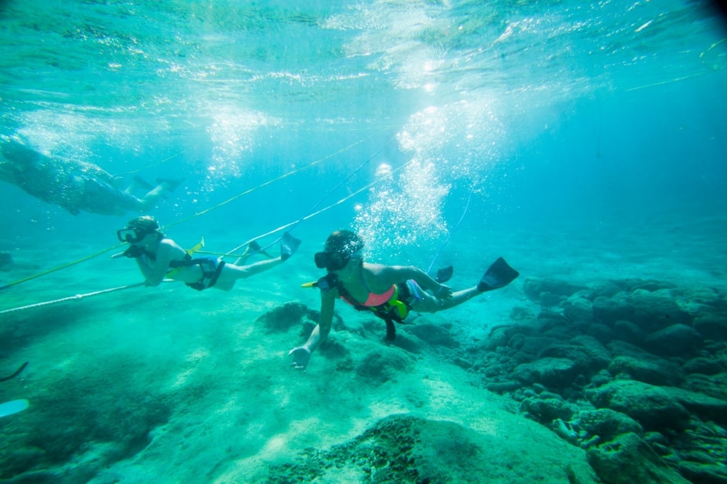 People on a snuba adventure in Chankanaab Beach Adventure Park, Cozumel