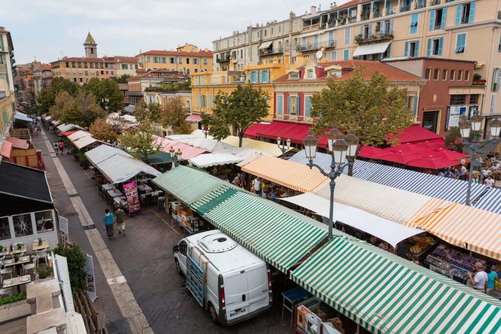 Market stalls lined up on Marché Aux Fleurs Cours Saleya, Nice