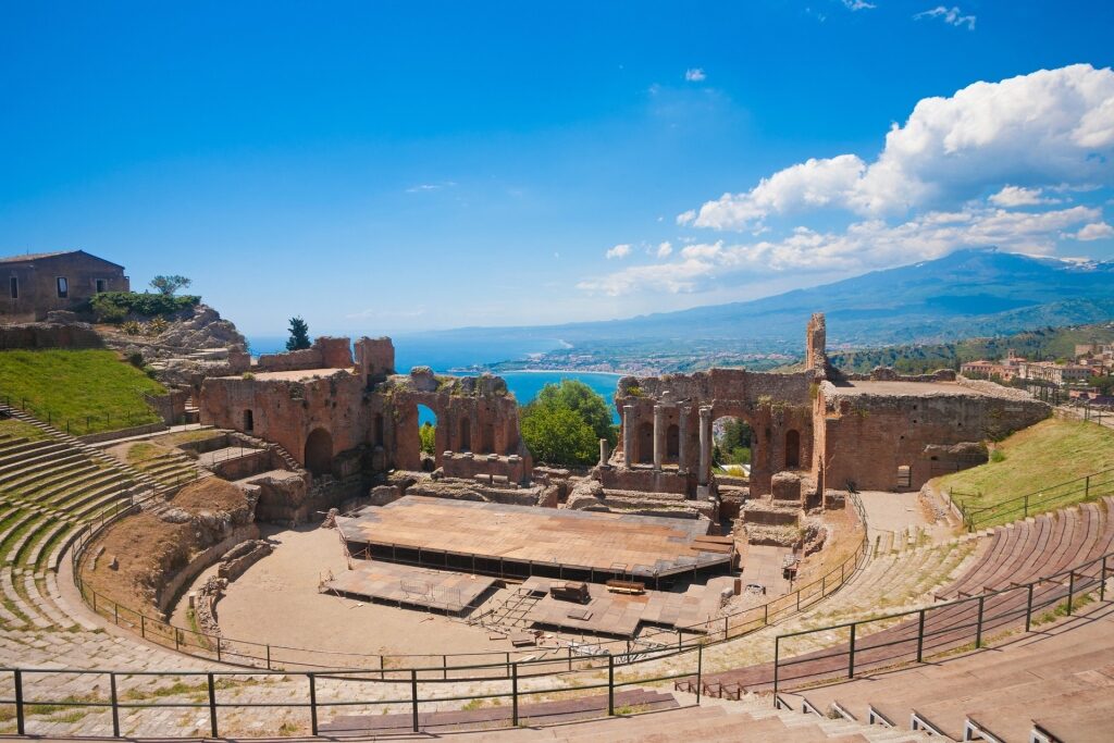 Historical Roman theater with Mt Etna as backdrop