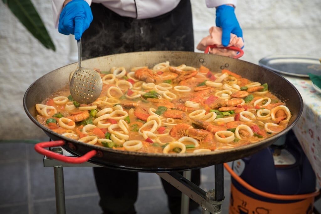 Chef cooking seafood paella