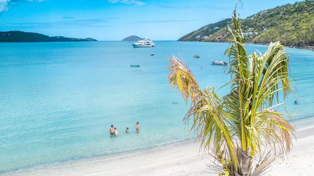 People swimming in turquoise waters of Magens Bay, St. Thomas