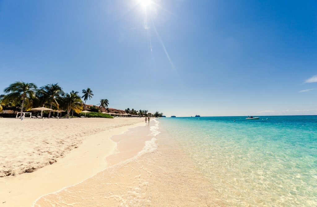 Seven Mile beach with white sand and clear, blue water