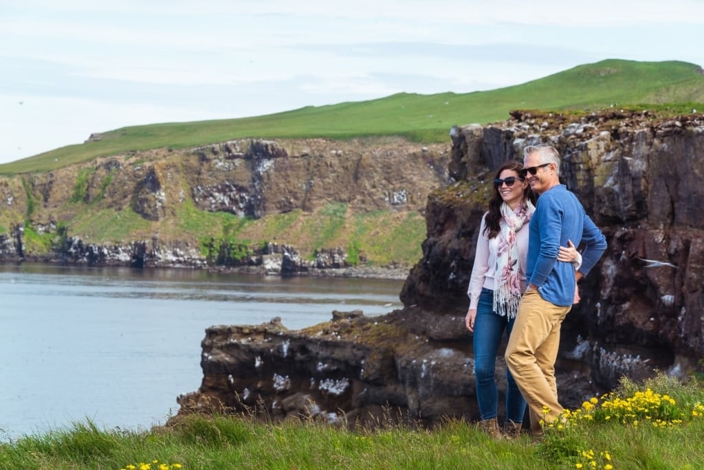 Couple sightseeing from Grimsey Island, Iceland