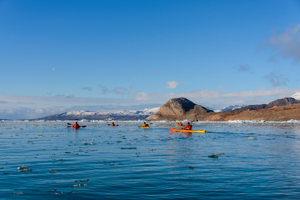 People kayaking in Greenland