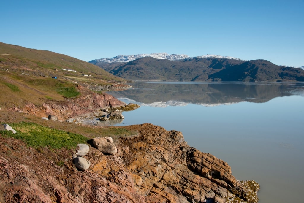 Calm water within Tunulliarfik Fjord, Greenland