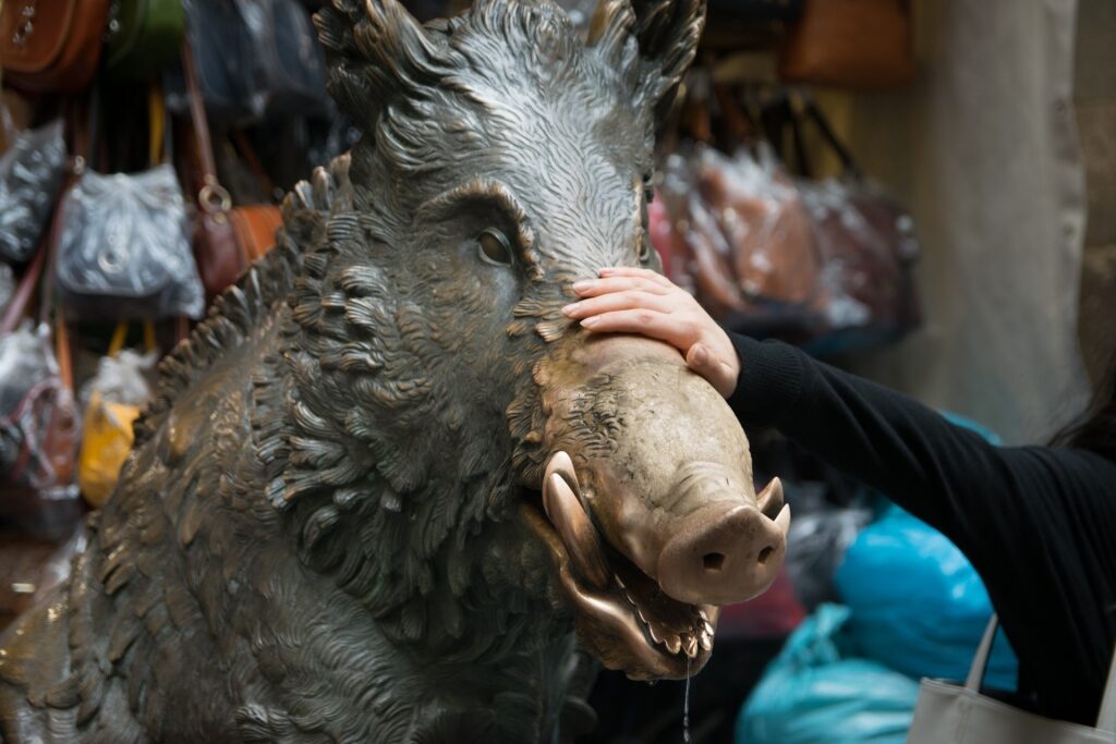 Iconic boar statue in Piazza del Mercato Nuovo, Florence