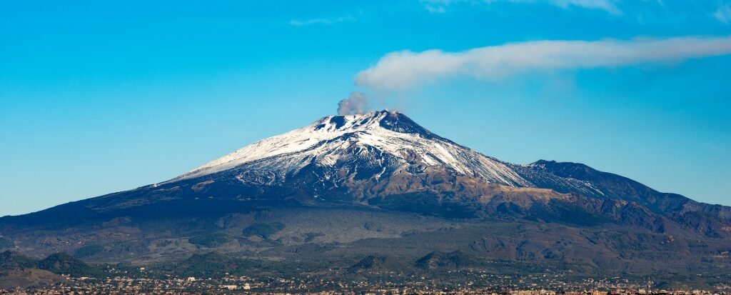 Beautiful snowy peak of Mount Etna in Sicily, Italy