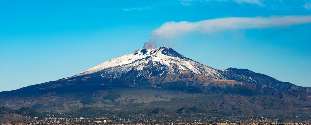 Beautiful snowy peak of Mount Etna in Sicily, Italy