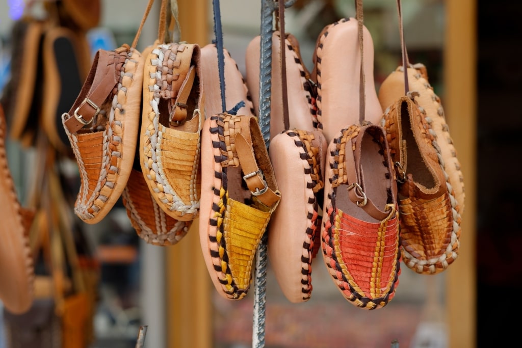 Leather slippers and shoes on display