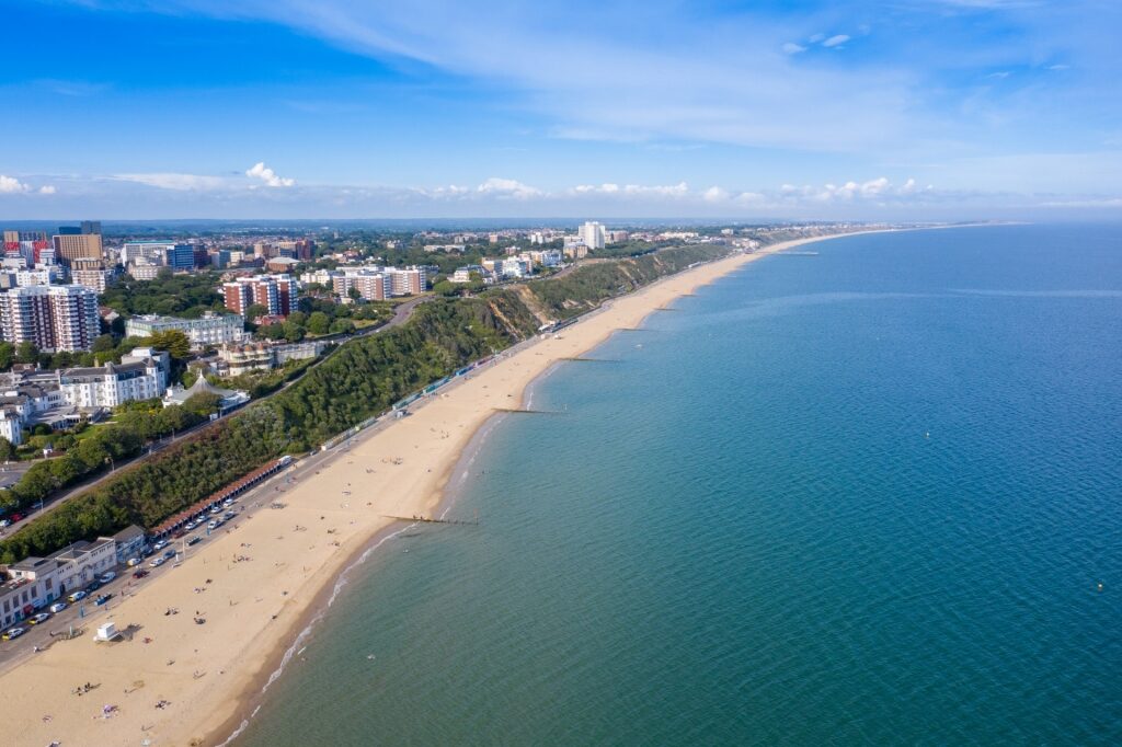 Long stretch of sands of Bournemouth Beach in Dorset, England
