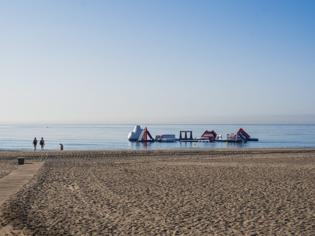 Water activities along Playa De La Rada, Estepona