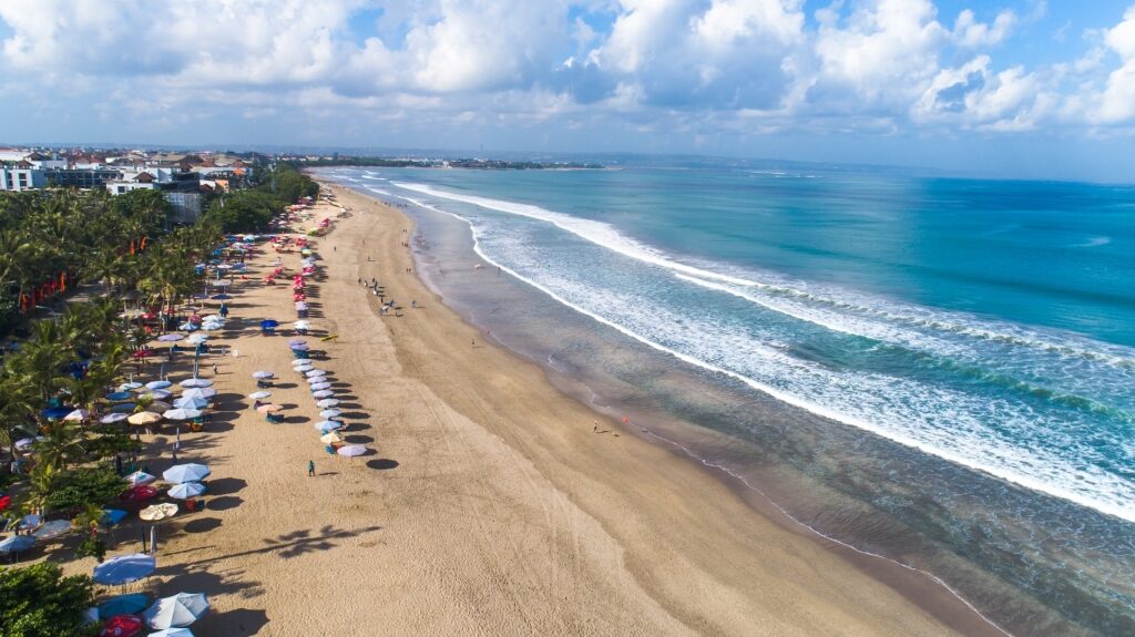 Long stretch of sands of Kuta Beach in Bali, Indonesia