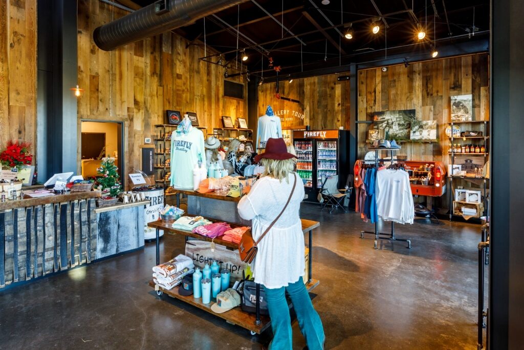 Woman shopping in Firefly Distillery, Wadmalaw Island