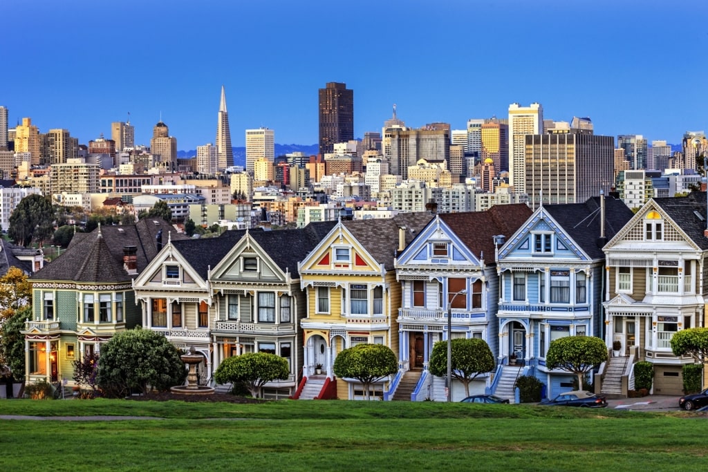 Colorful houses across Alamo Square Park