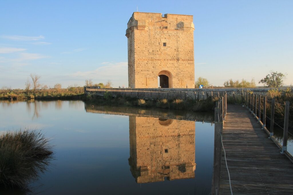 Carbonniere Tower reflecting on water