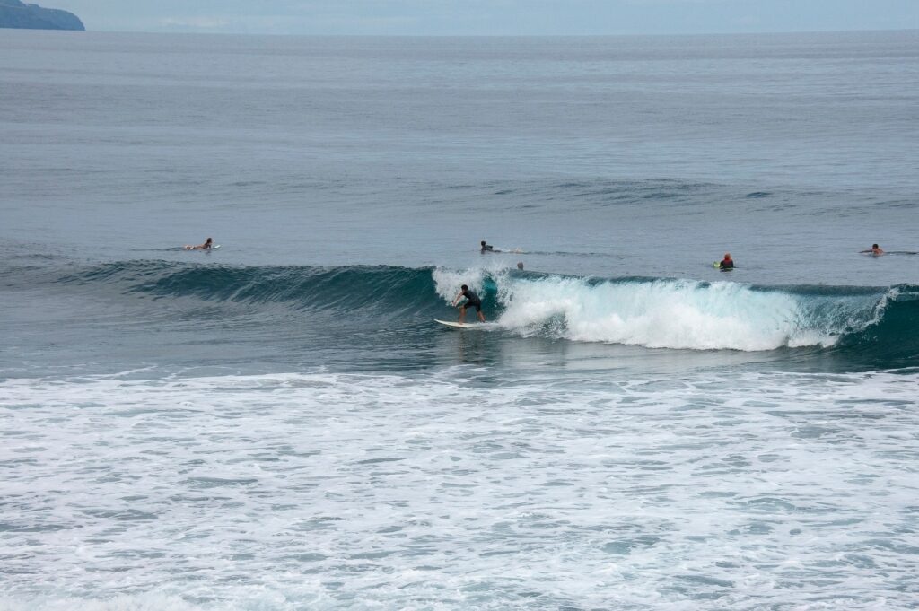 People surfing Praia do Areal de Santa Bárbara, São Miguel