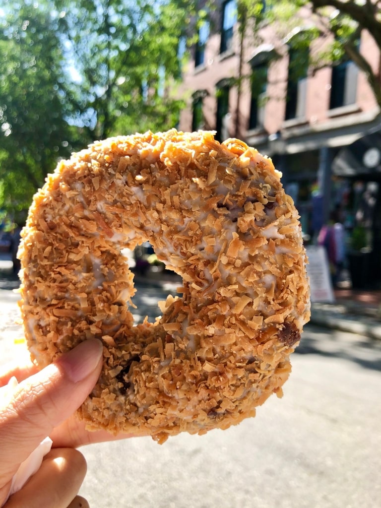 Person holding Holy Donut